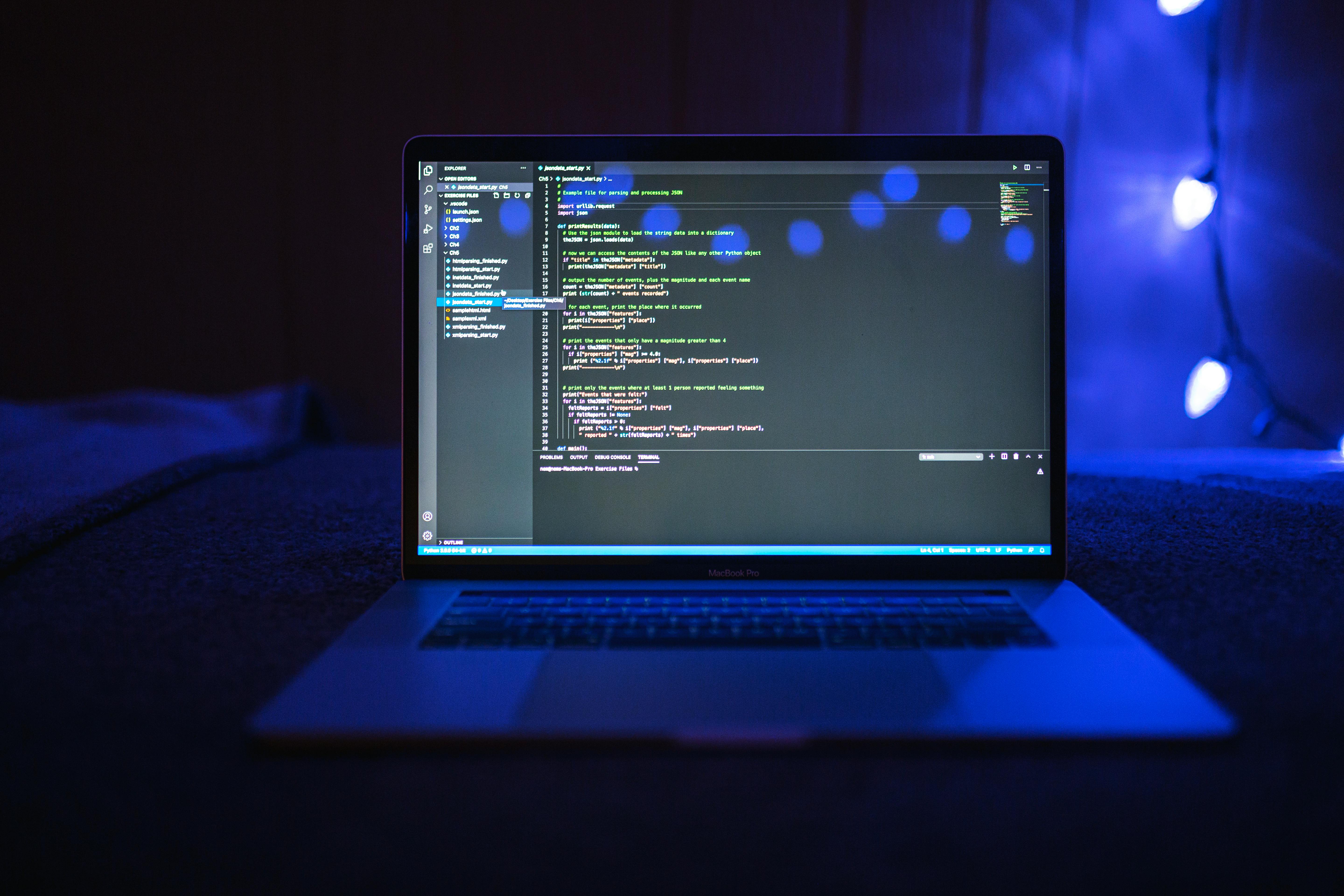 Developer fixing bugs and debugging code late at night